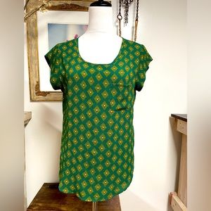 Dress for success in this lucky green blouse. Never worn!